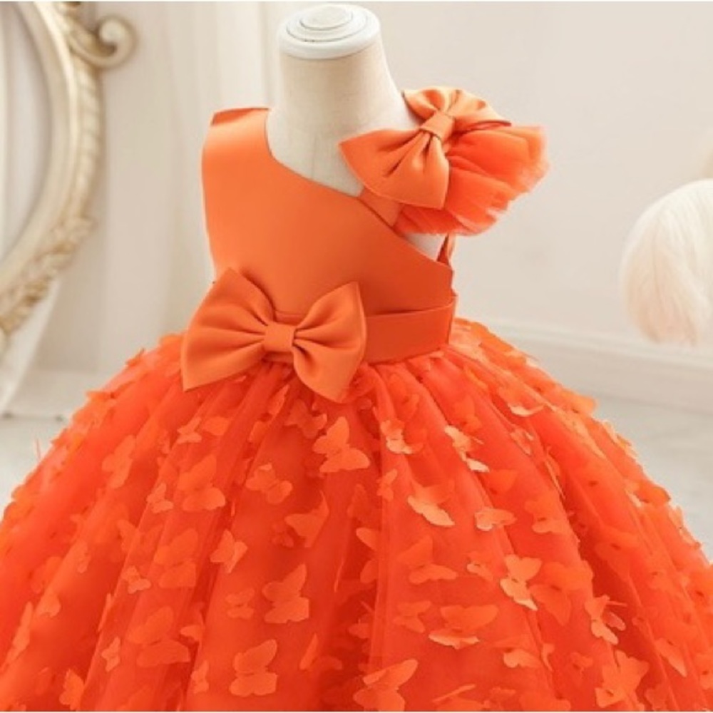 Girl beautiful tangerine color pageant dress